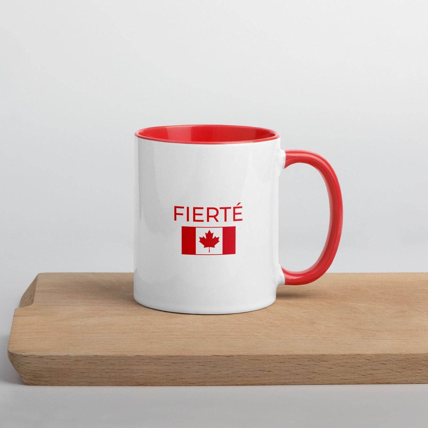 red and white mug with fierté and canada flag